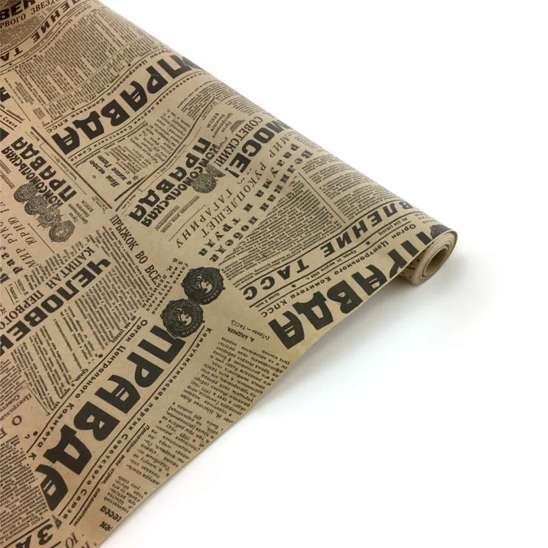 Крафт-бумага упаковочная "Правда"  рисунок черный на коричневом / рулон 70 см*10м, 42 гр/м.кв