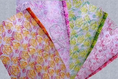 Пленка в рулоне цветная 70см х 0,24кг. Розы ажурные (желто-зеленые)