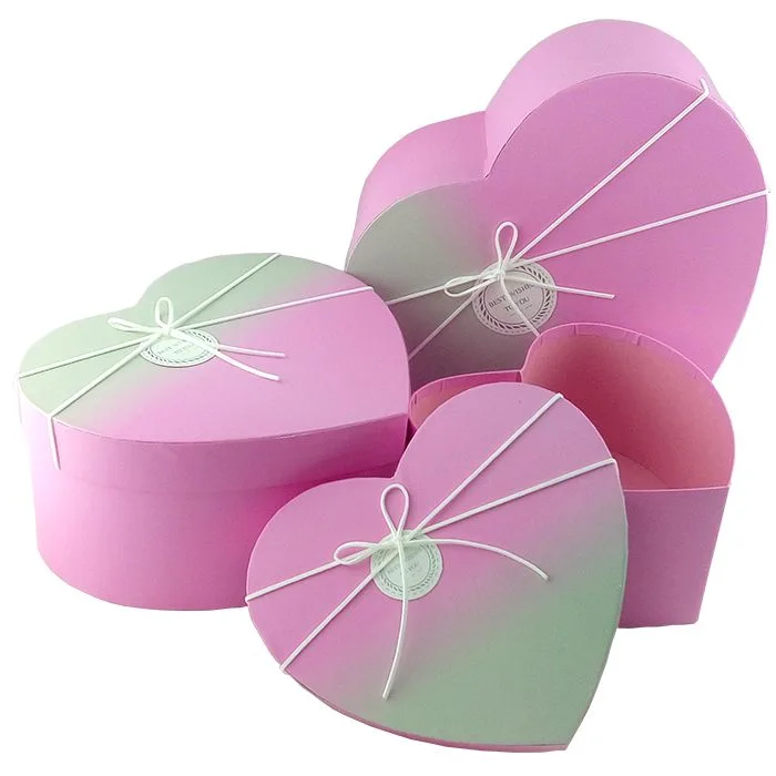Набор коробок 3 в 1 "Градиент" Розово-персиковый с бантом /сердце 22*20,5*11/27*24,5*13/31*28,5*15см