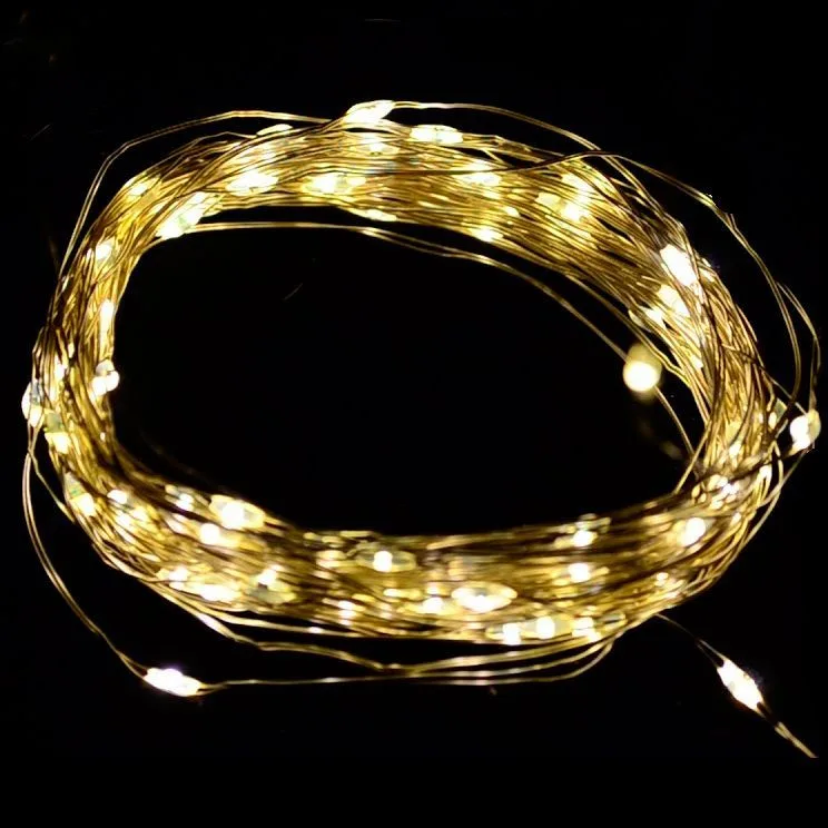 Светодиодная гирлянда "Роса" на батарейках / 7м, 70 теплых белых светодиодов на серебристом проводе